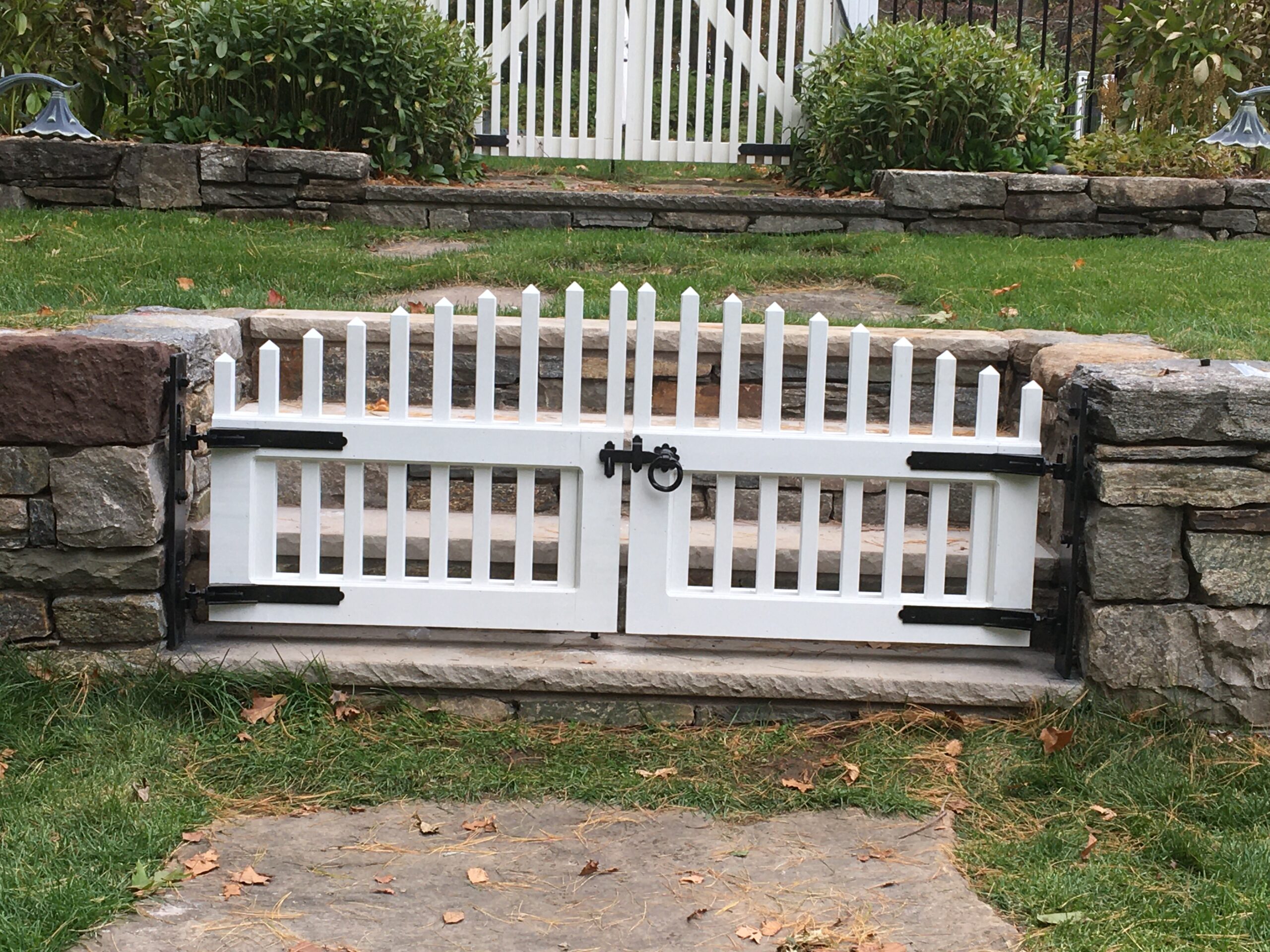 Arched cedar picket double gate complementing a historic Connecticut home, Arrow Fence Inc