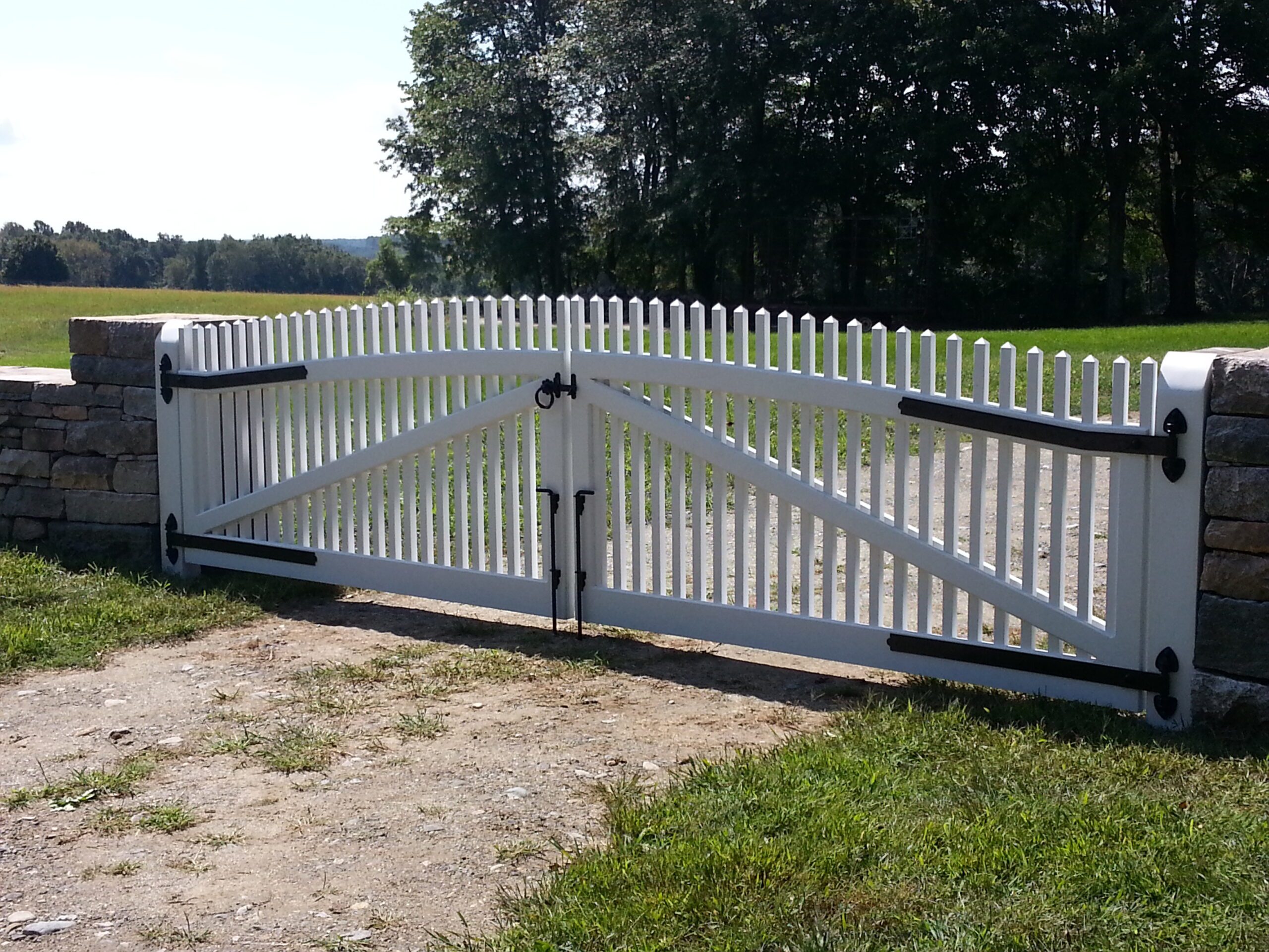 Arched Northern White Cedar picket double gate with strap hinges stained white, Arrow Fence Inc