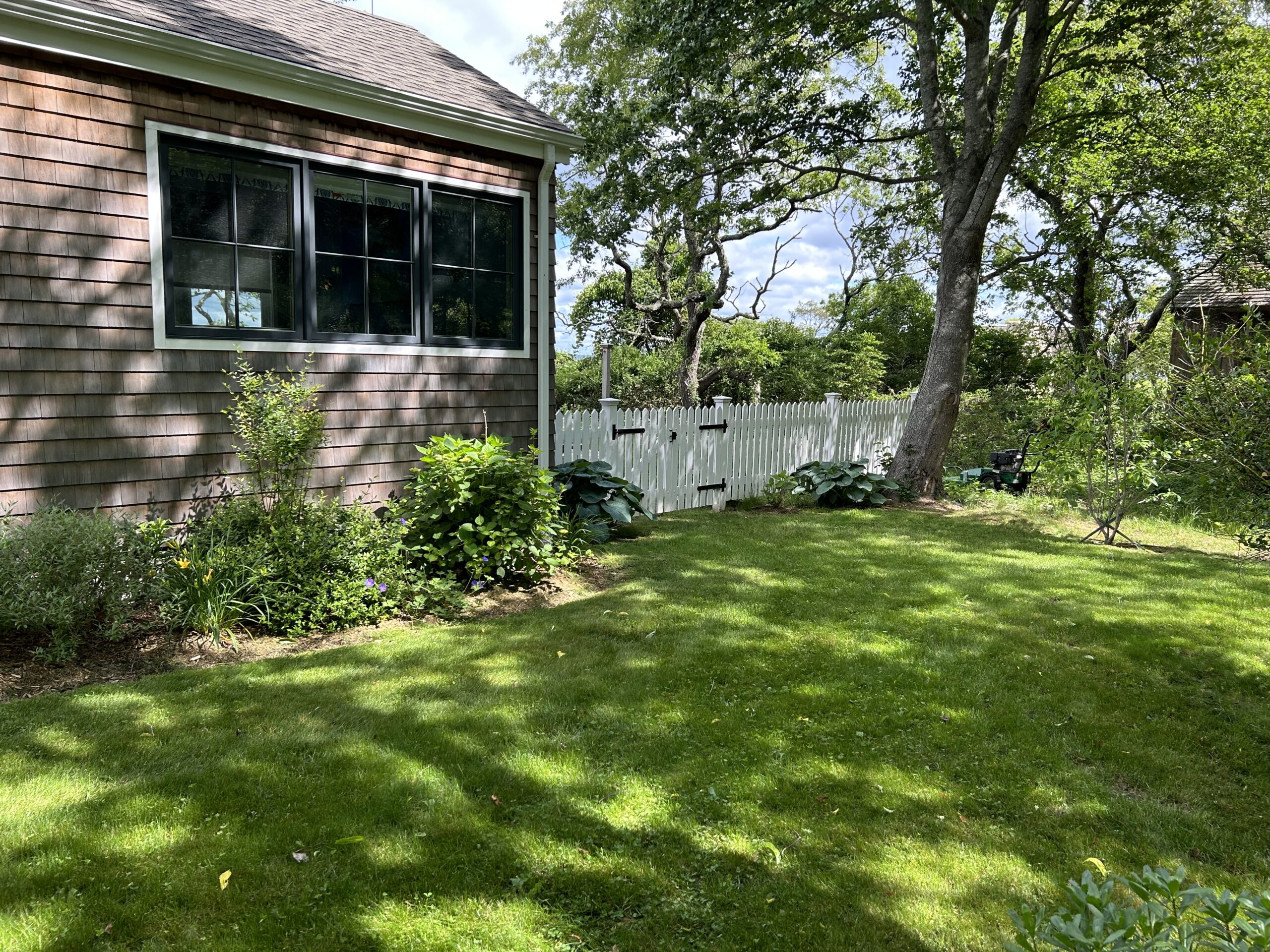 Northern White Cedar picket fence with white stain and double gate, Arrow Fence Inc Connecticut