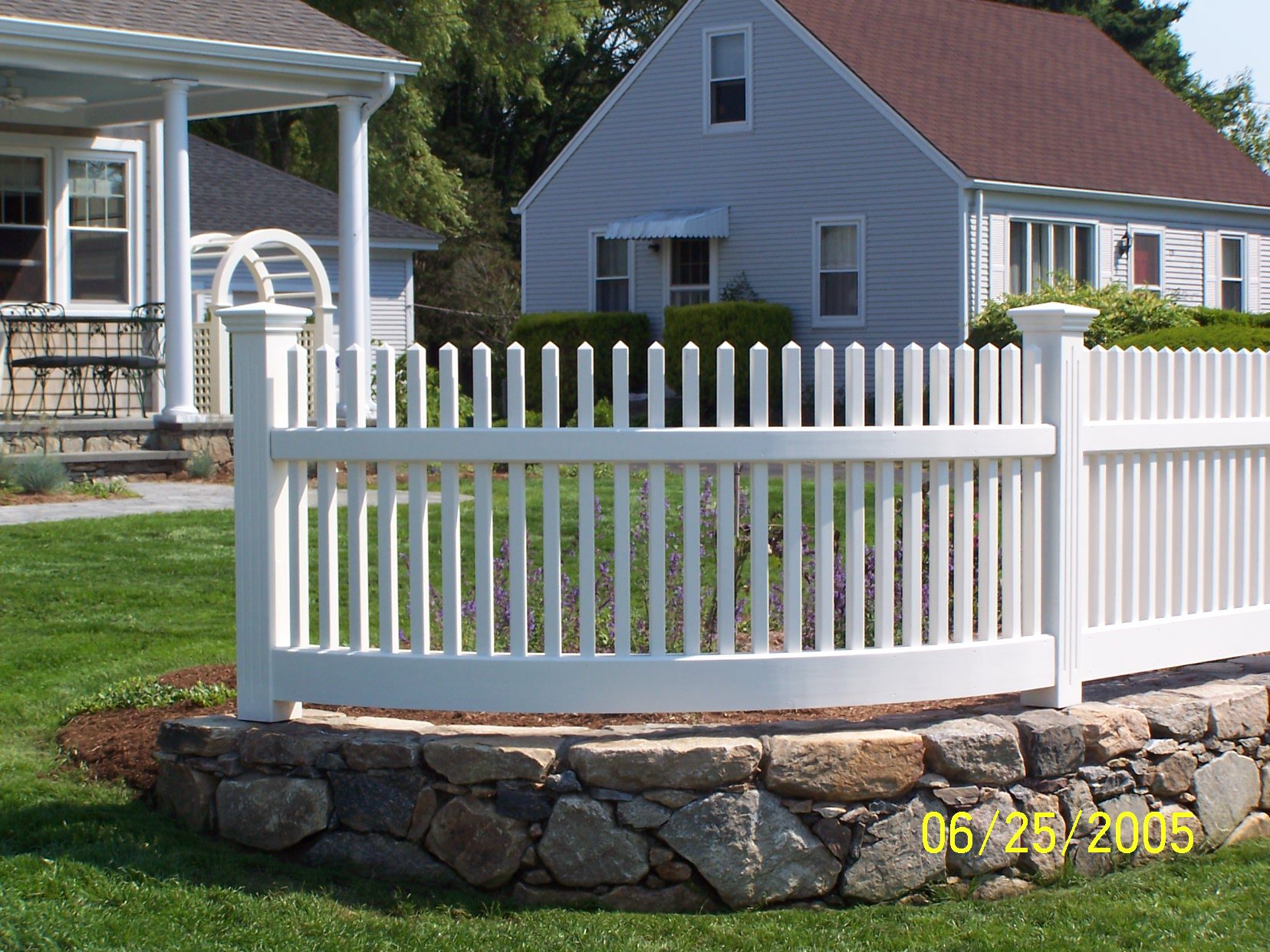 Curved radius Northern White Cedar picket fence stained white, Arrow Fence Inc Connecticut