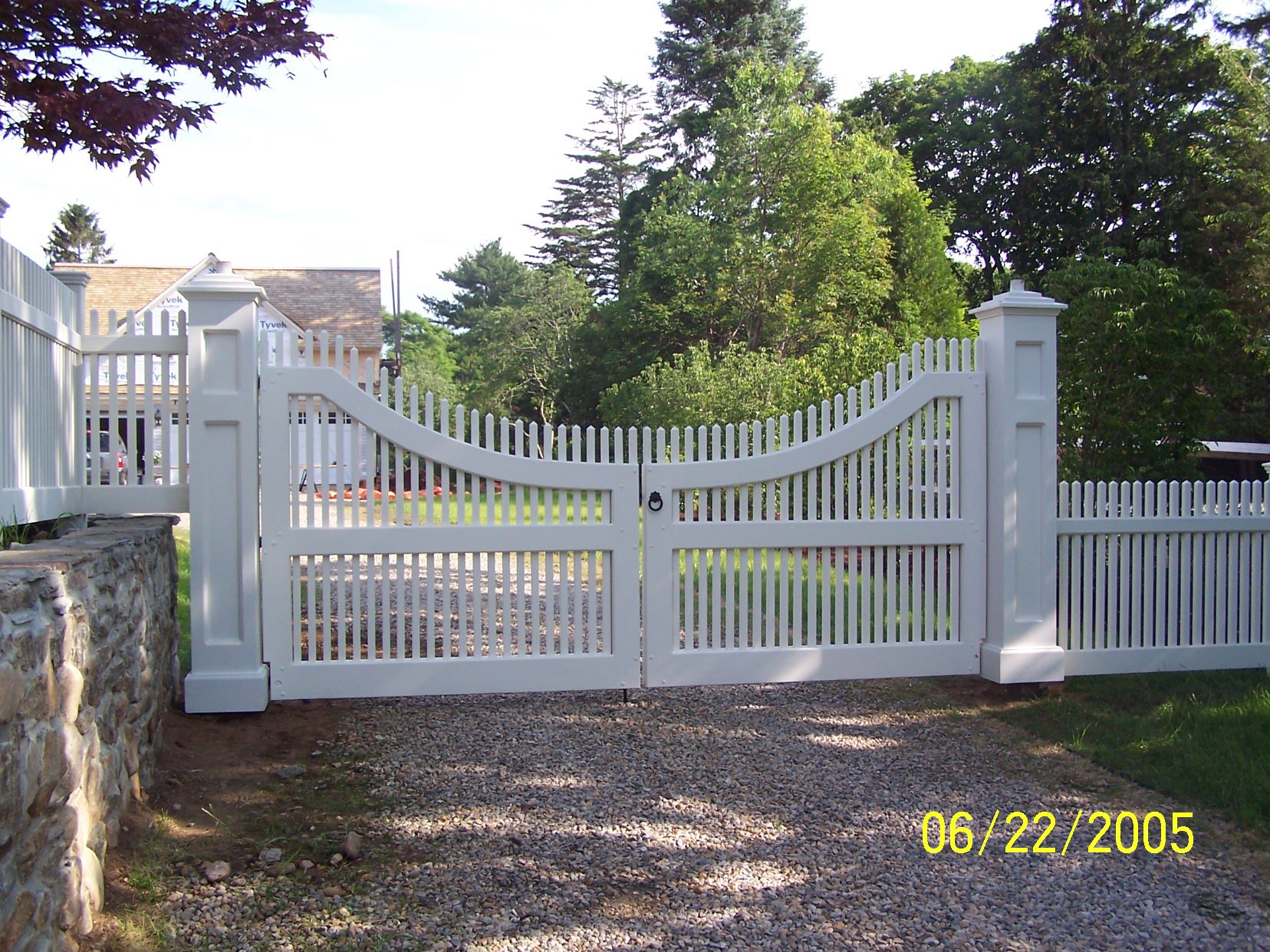 Curved-top cedar picket double gate as decorative accent, Arrow Fence Inc Connecticut